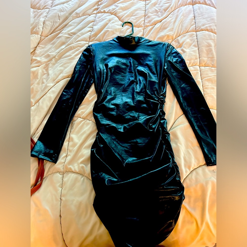 Black “leather” ruched dress.